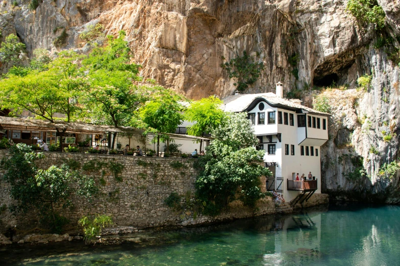 a small house in the middle of a river