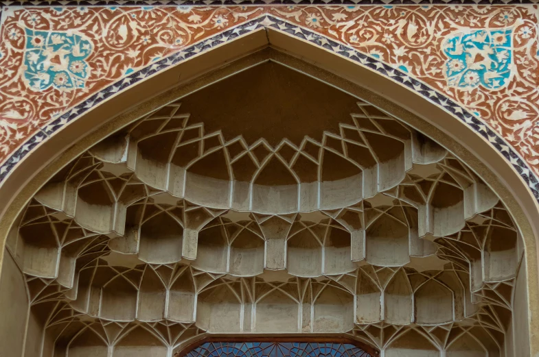 an ornately decorated building with blue doors