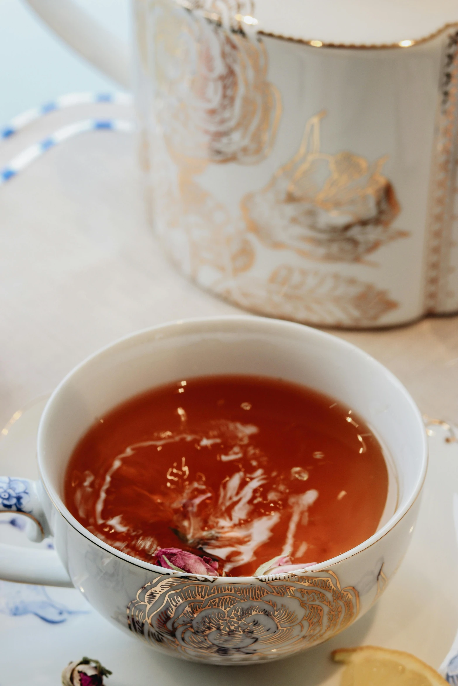 a bowl full of soup on top of a white table