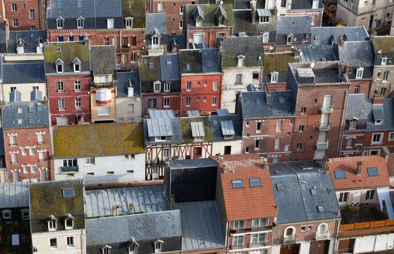 a lot of old buildings with different colored roofs