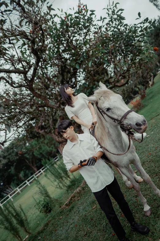 the couple is enjoying time on the horse outside