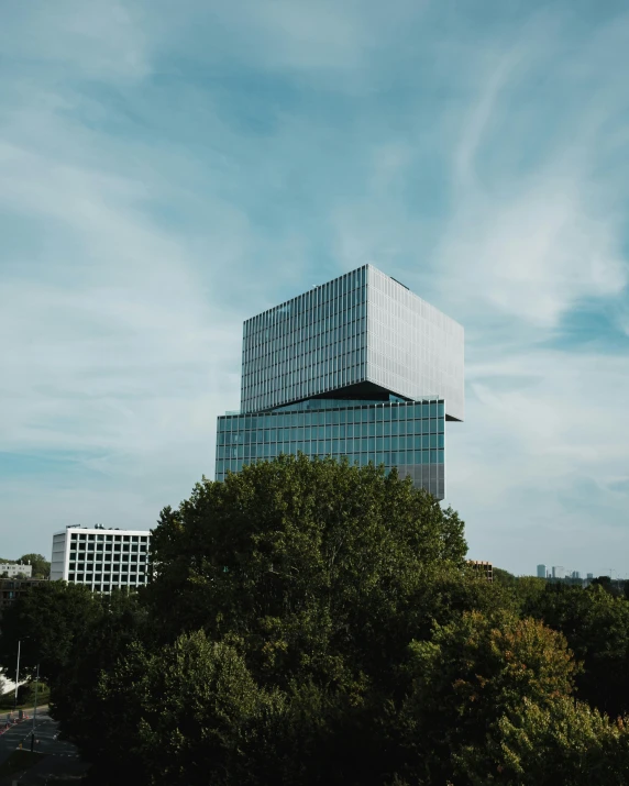 view of a modern building and trees in a city