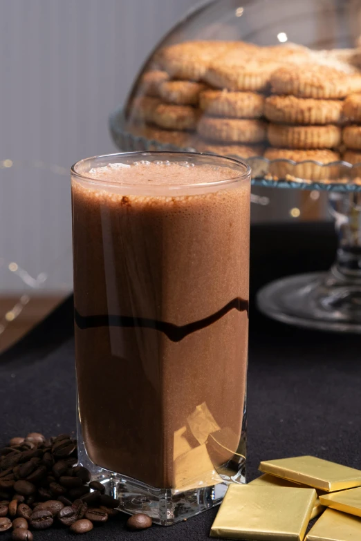 there is some cookie and chocolate in the glass on the table