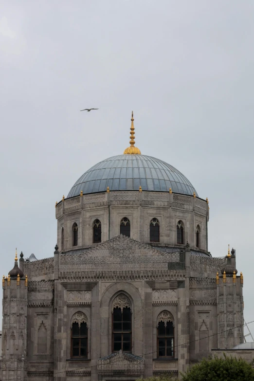 a large building with a small clock tower on top of it