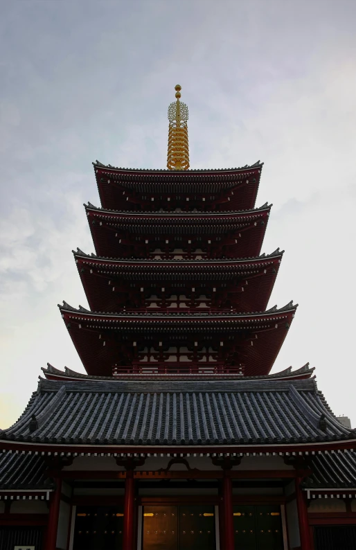 a temple with an awning in front of it