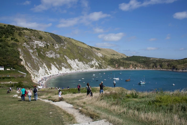 the large body of water is surrounded by hills and hills