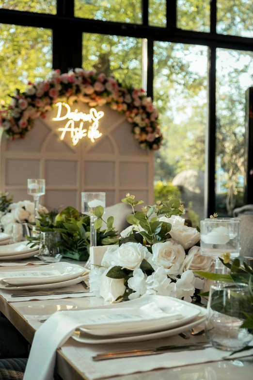 a long table with white flowers on it