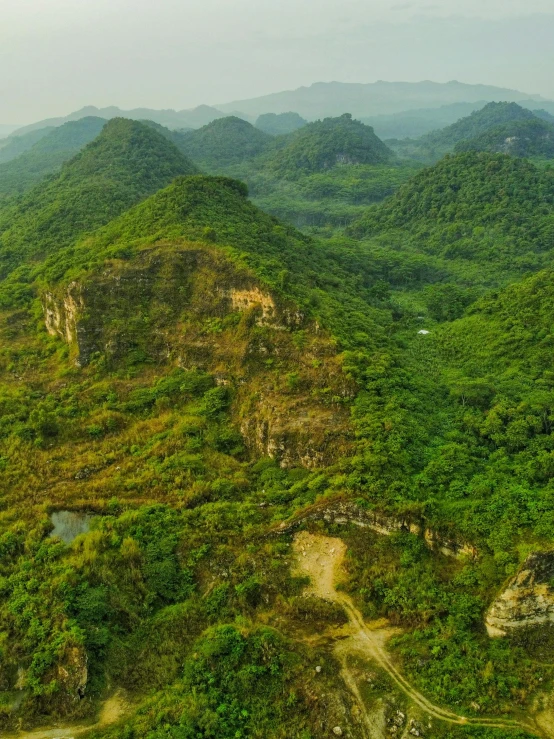 a view from a bird's eye point shows the green mountains and rivers