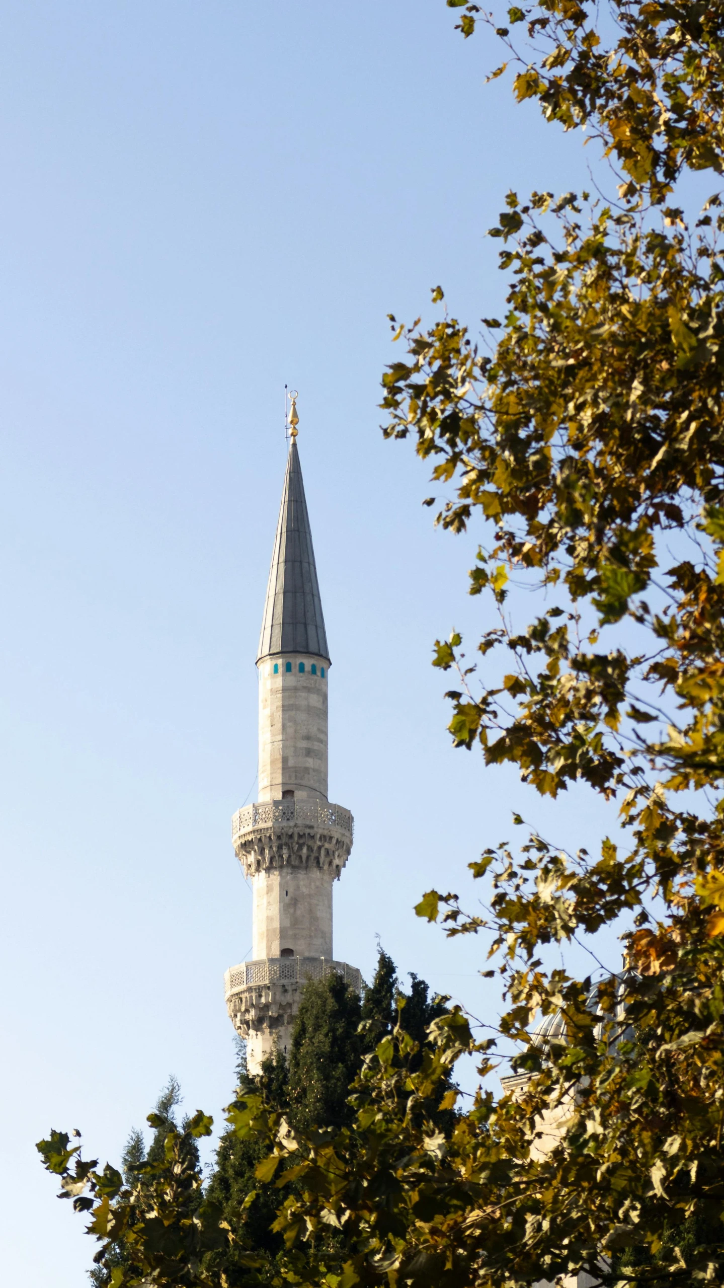 an image of a very tall building up in the sky