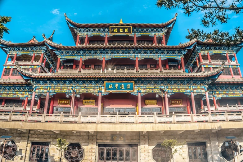 a temple that is decorated and has columns