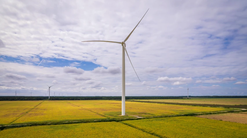 a very big windmill in the middle of nowhere