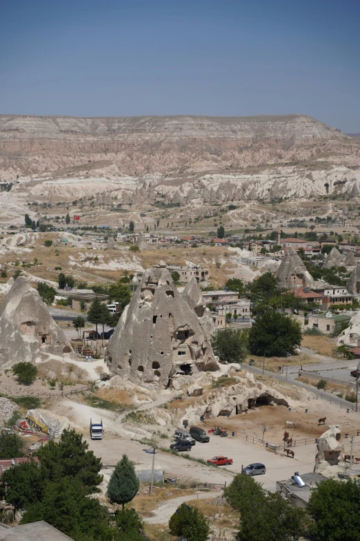 a city sits in a rocky and open area