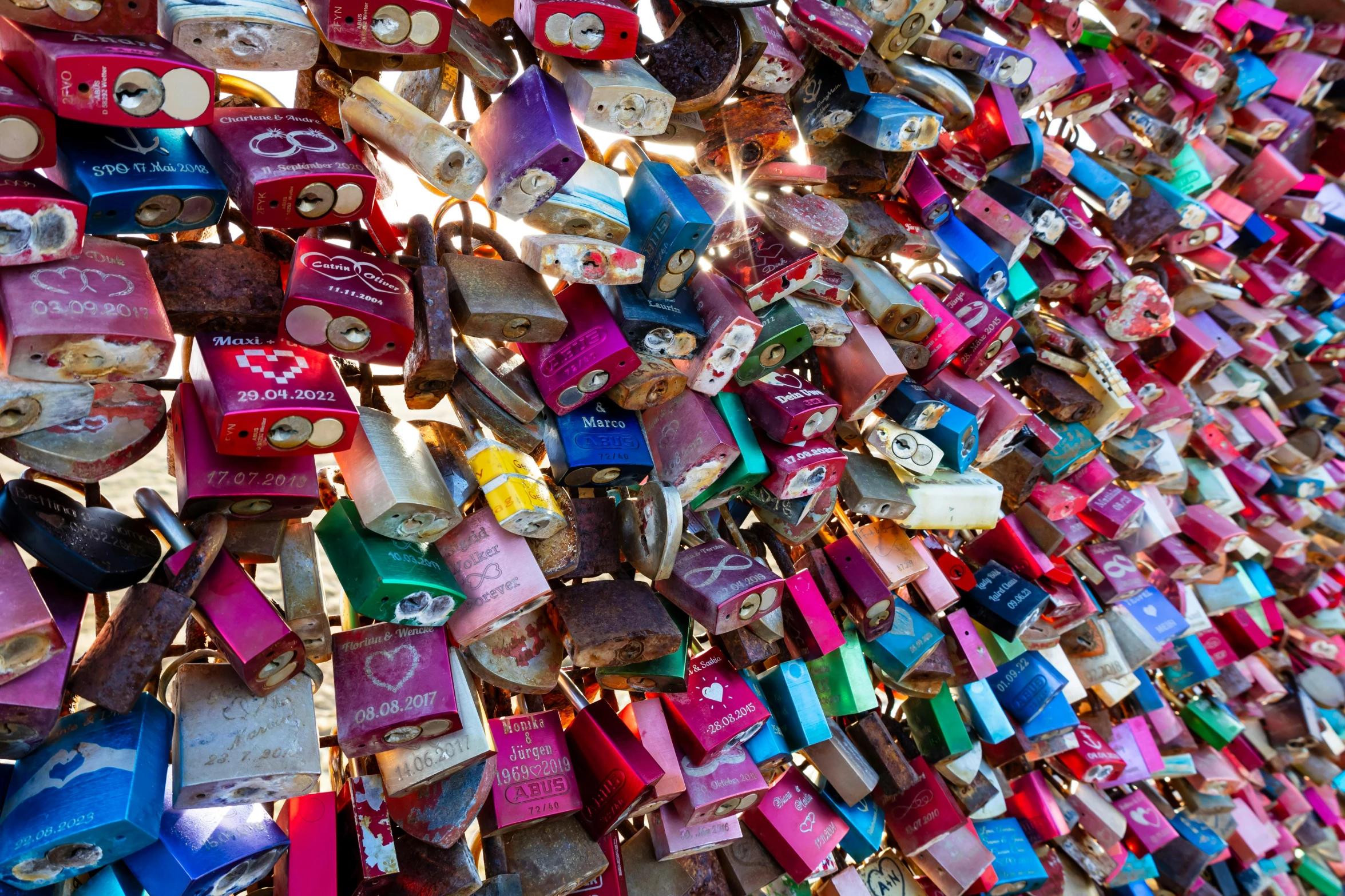 many padlocks that are very colorful in color