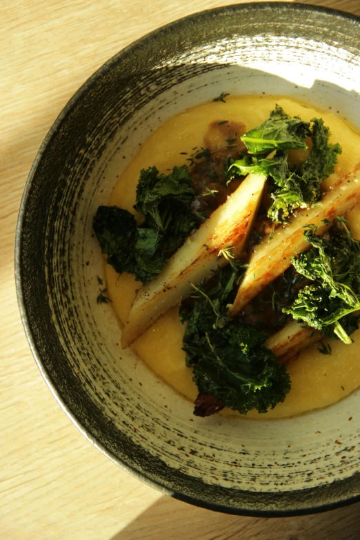 soup with fresh vegetables is served in a bowl