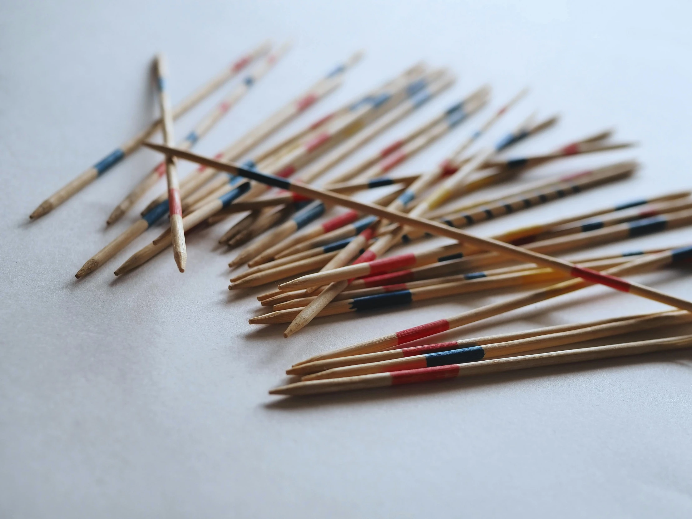 a bunch of matches sticks laying on top of a table