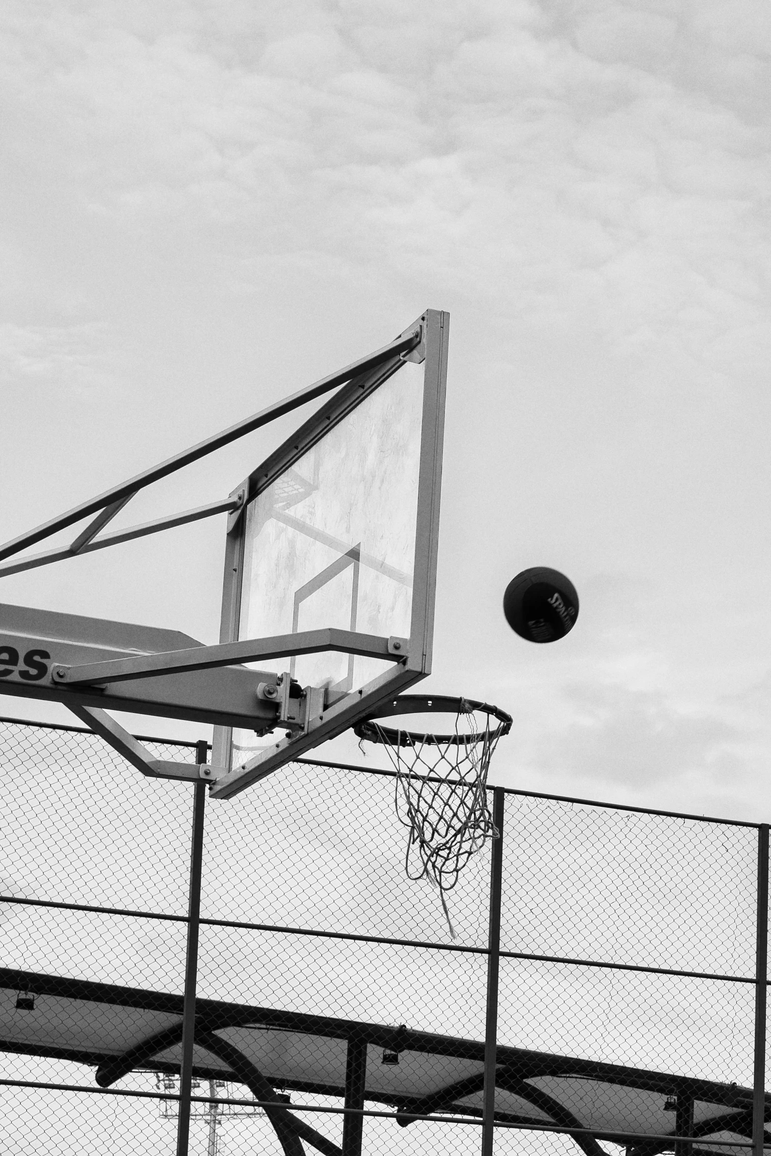 a basketball goal and hoop above a net