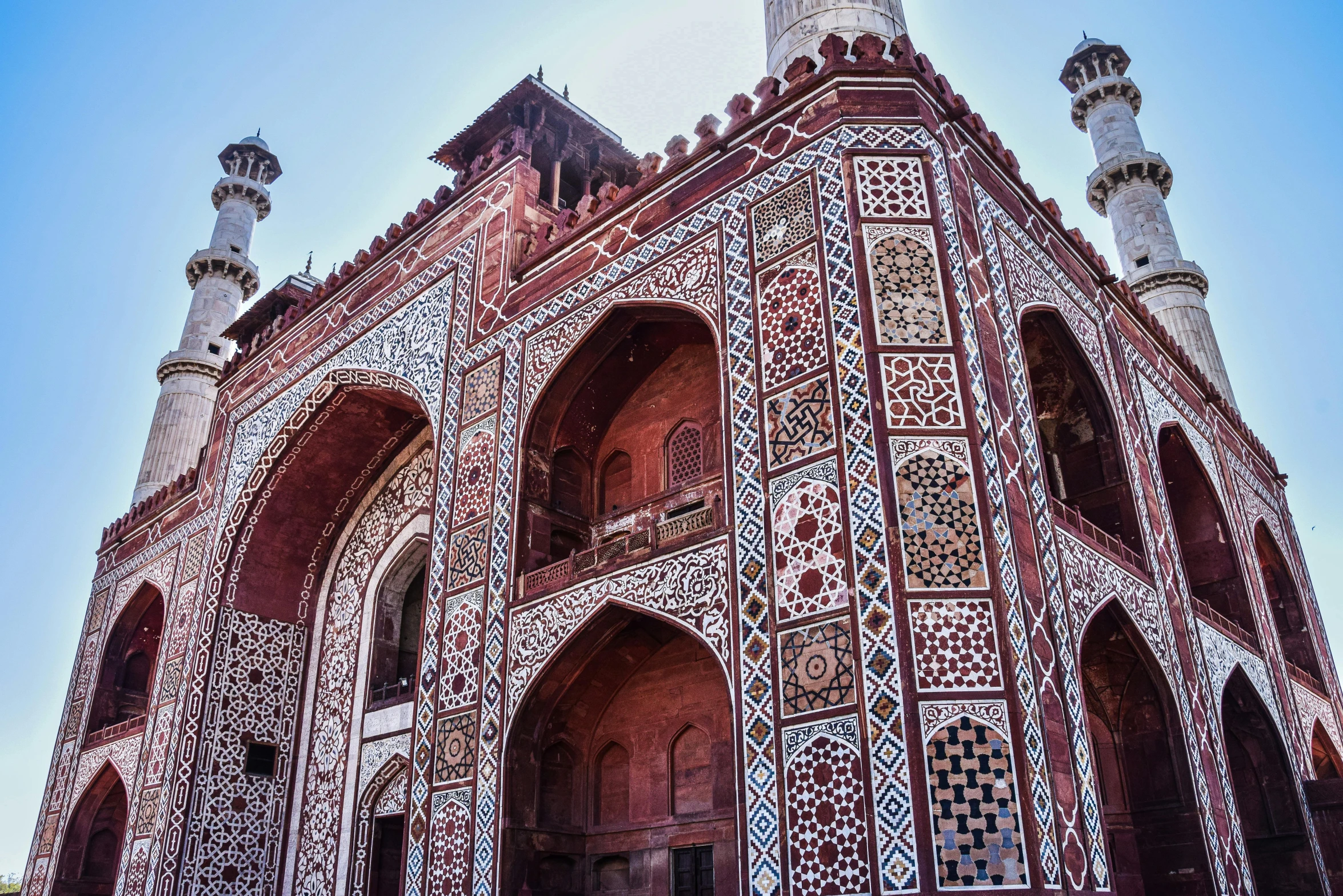 intricate, elaborate architecture is painted on a building