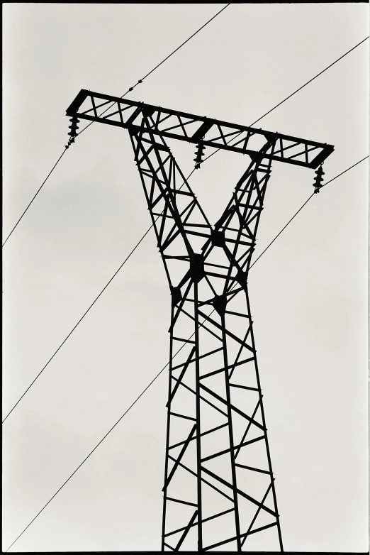 an electric tower and its wiring in the sky