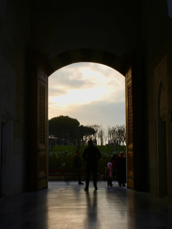 a couple is standing in the doorway