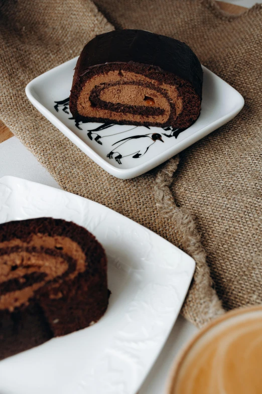 chocolate cinnamon roll on a plate on the couch