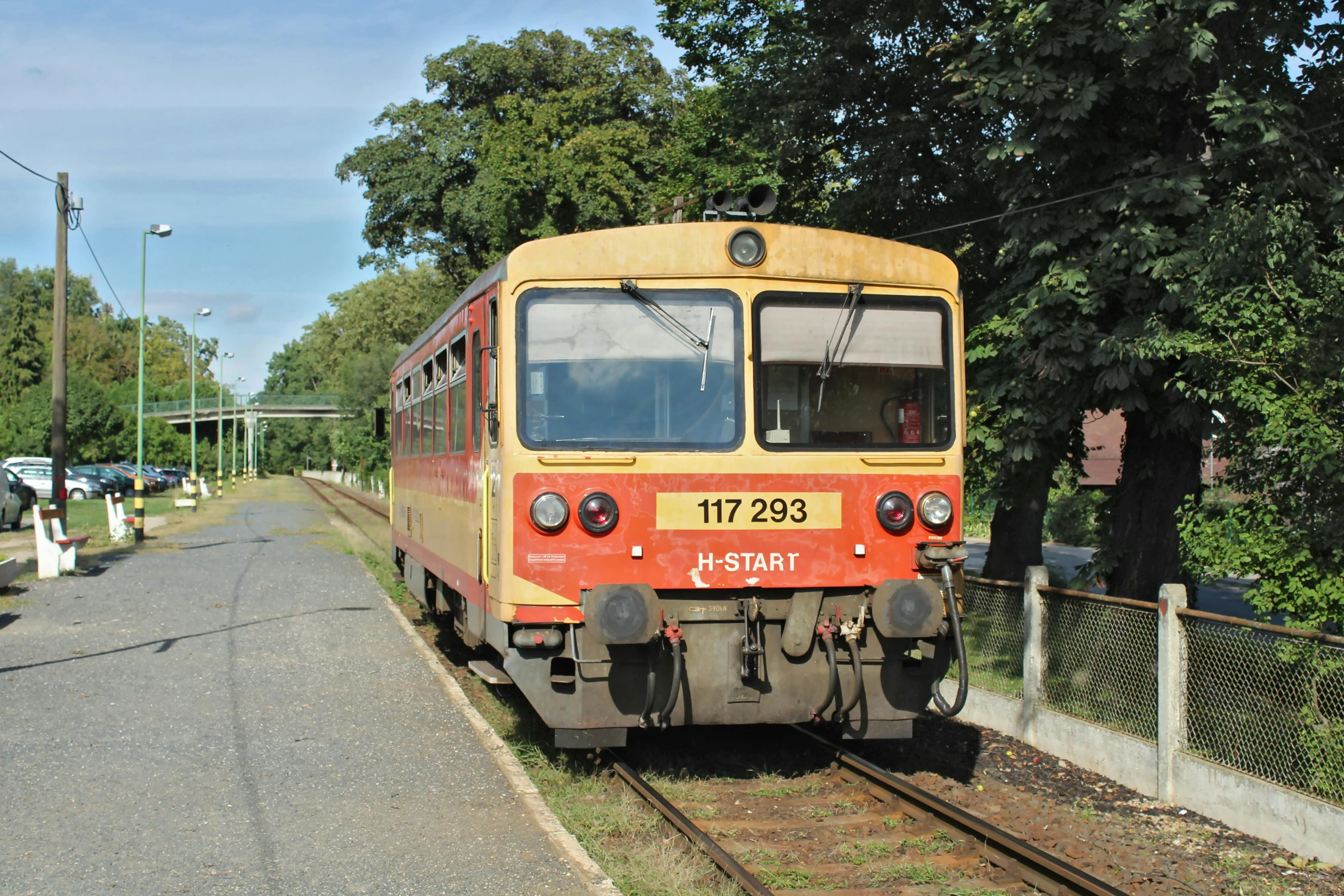 a train traveling through a rural country side