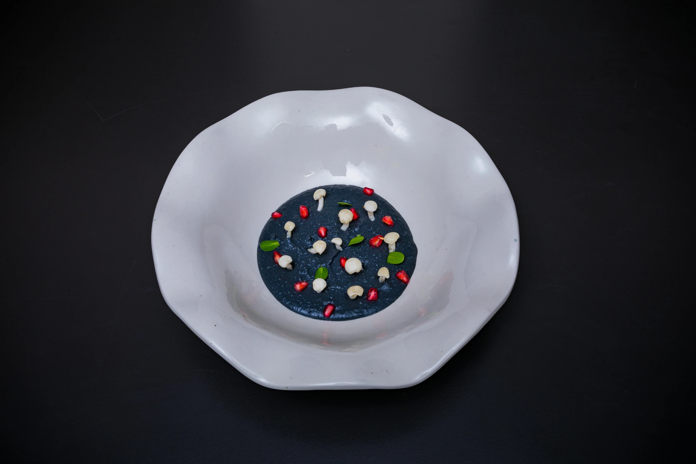 this is an image of a small white plate with candies on it