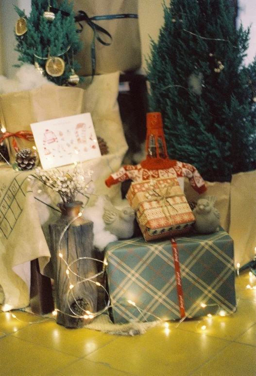 presents on a bed with holiday cards on them