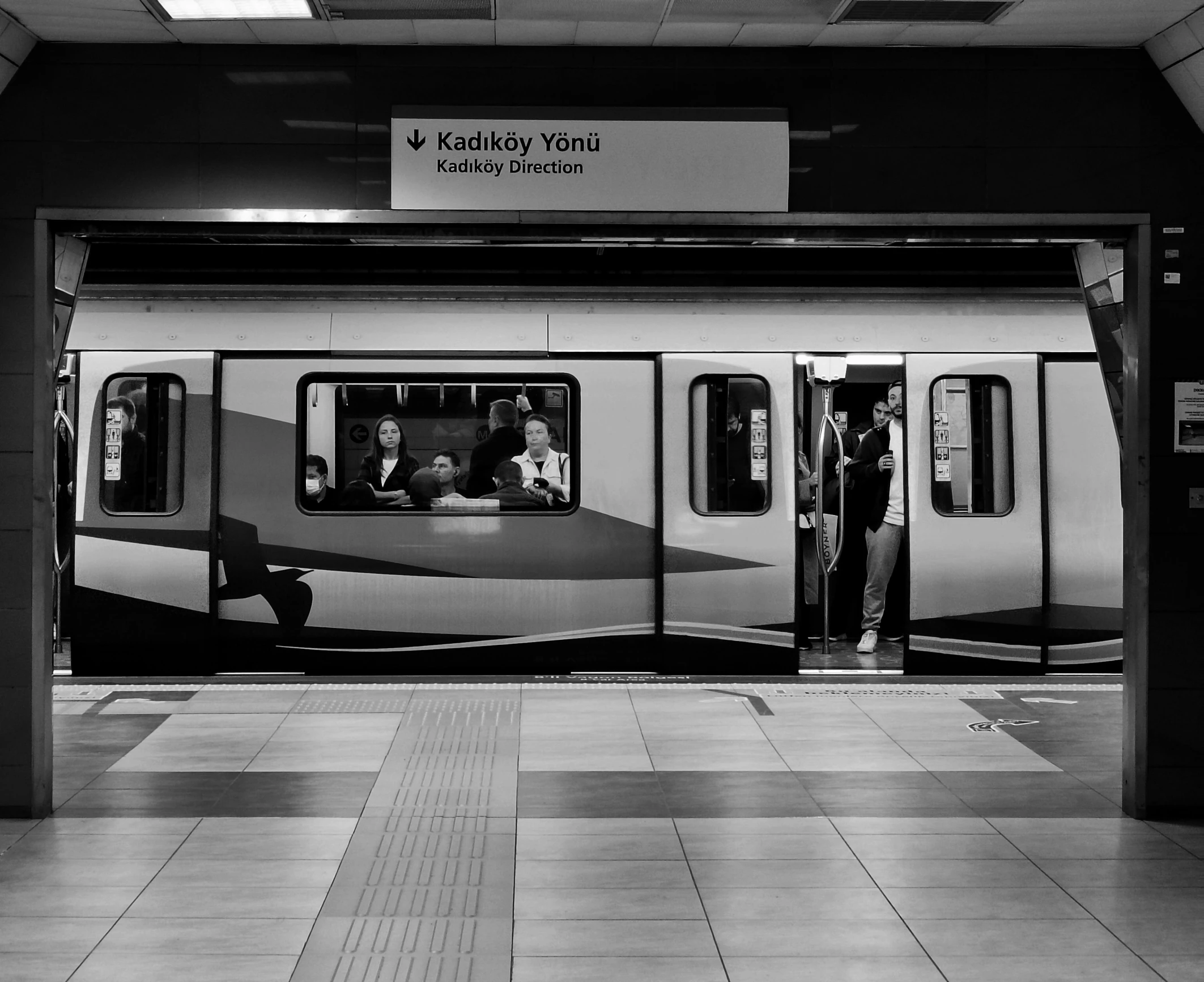 the subway is passing by with people on it