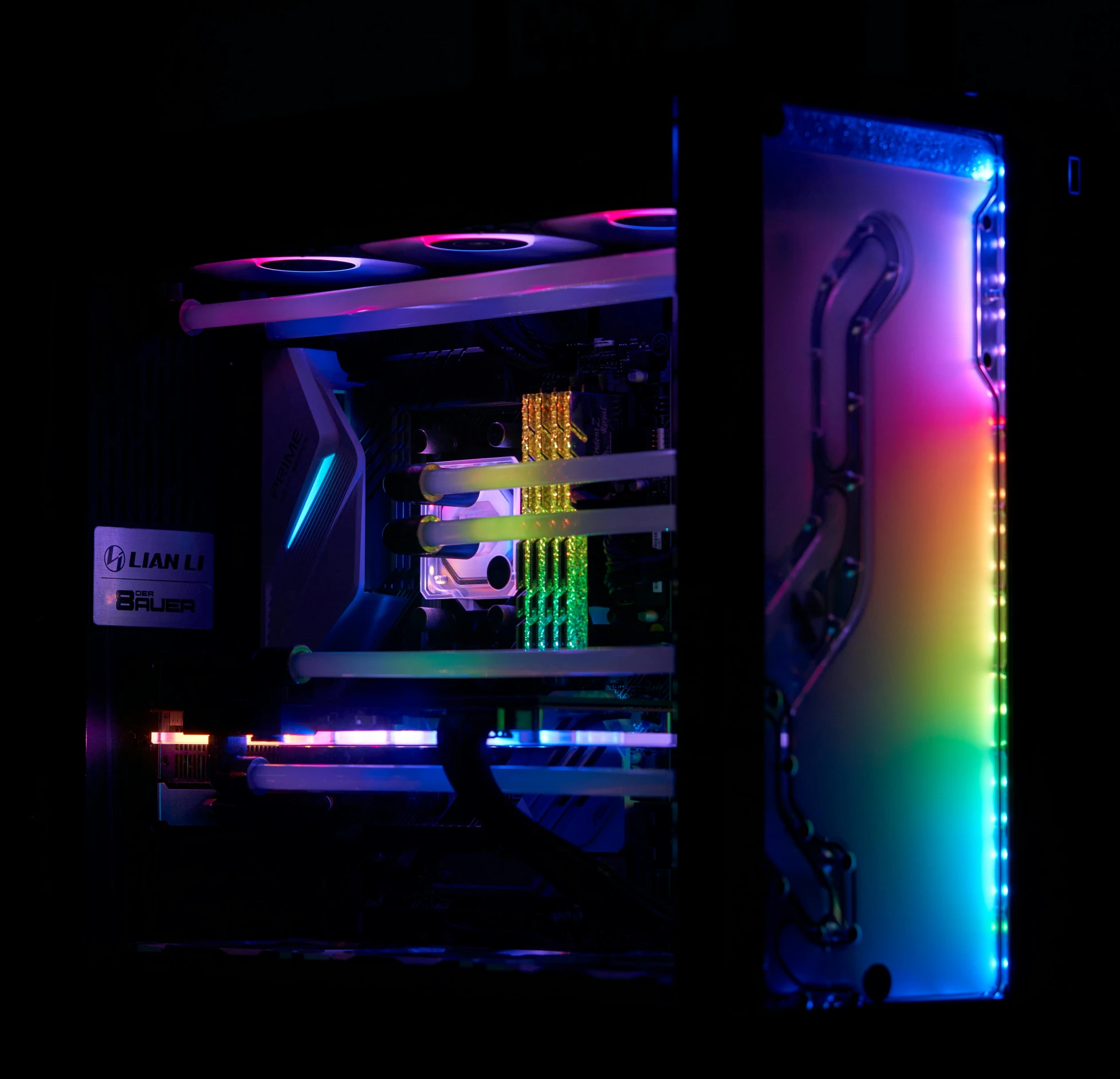 a multicolored computer case in the dark