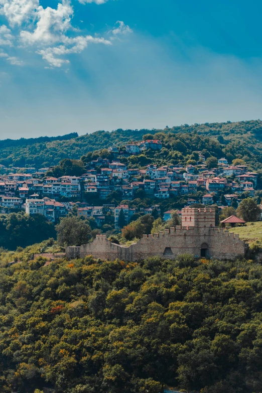 a small town perched on a rocky slope