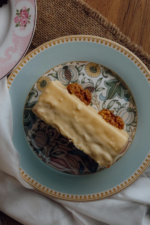 a plate on top of a table with a sandwich