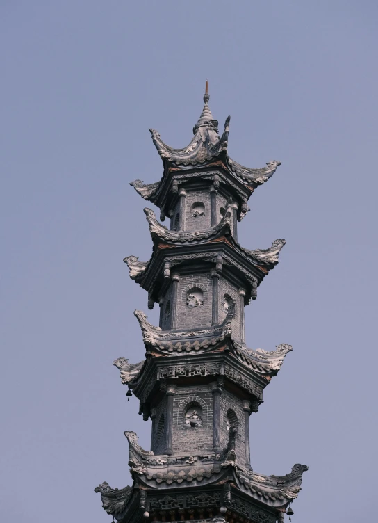 a large stone tower with clocks built into it