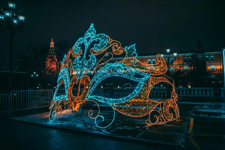 a large display of holiday lights in a city park