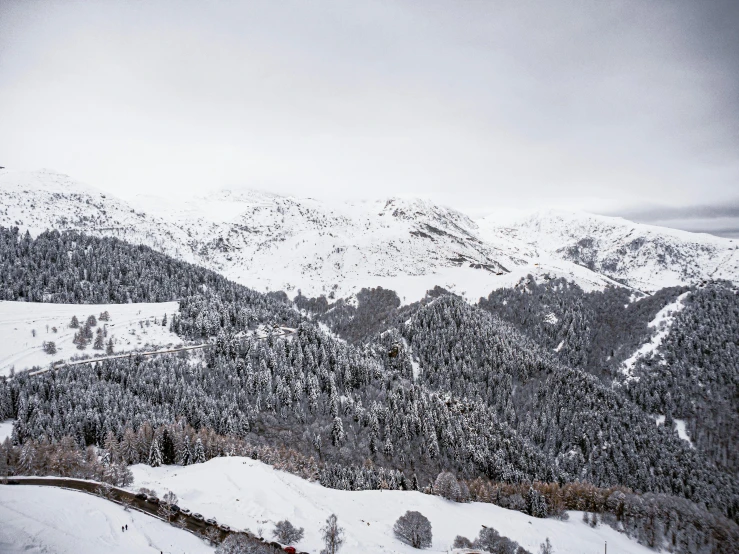 a mountain is seen covered in snow