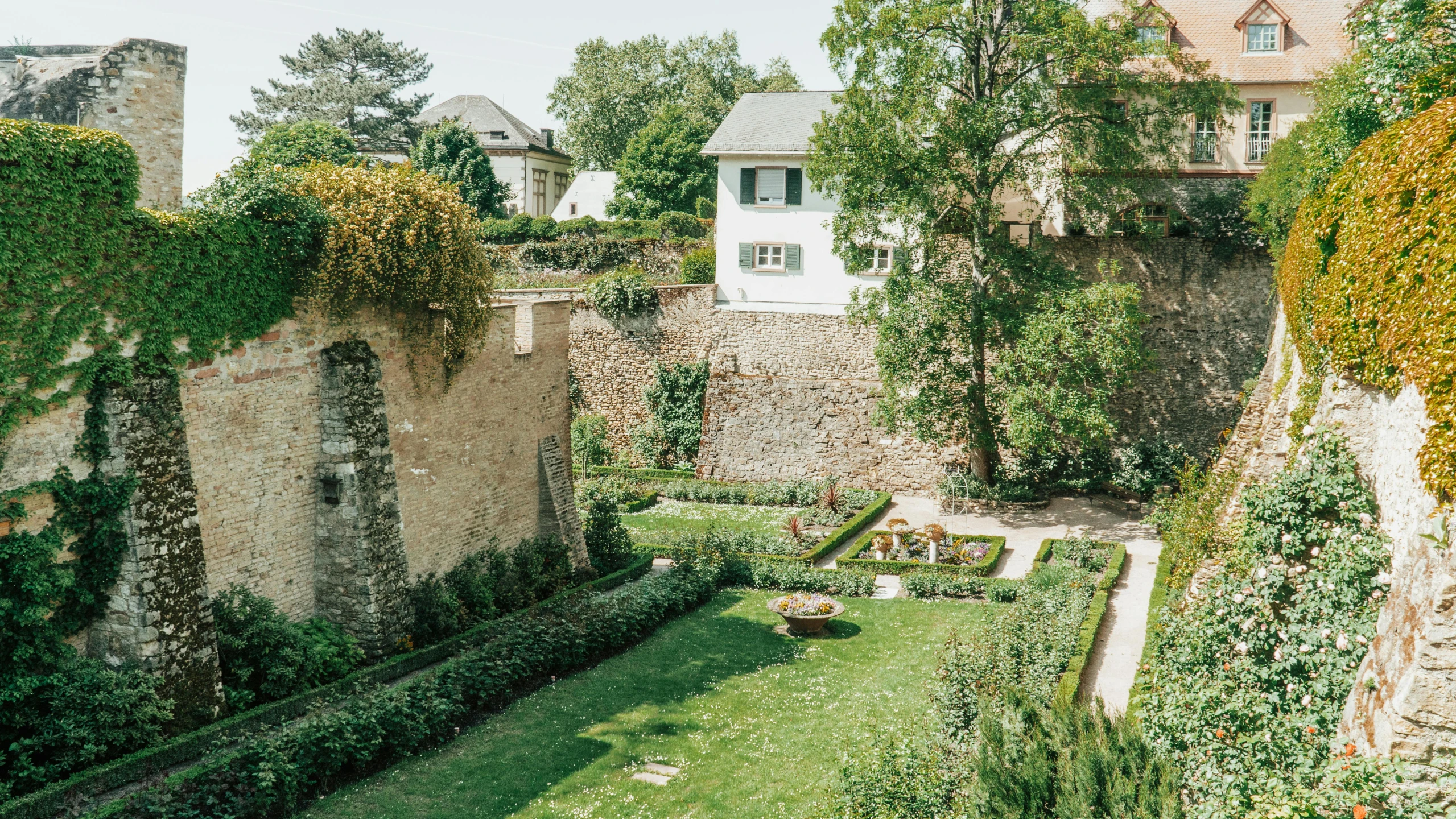 garden with trees and houses seen from above