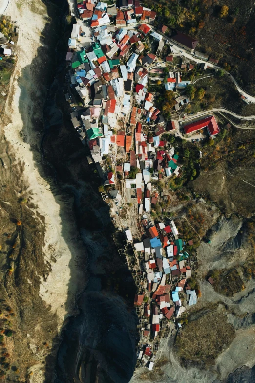 an aerial view of a neighborhood near a river