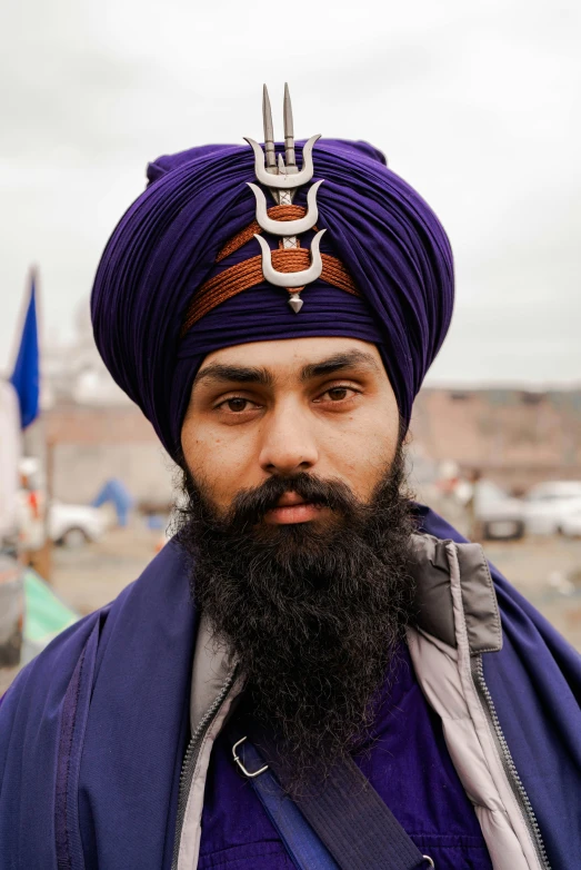 a man with a strange hat on his head