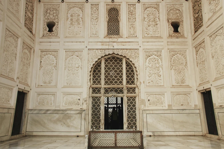 this is a decorative wall with ornate carvings