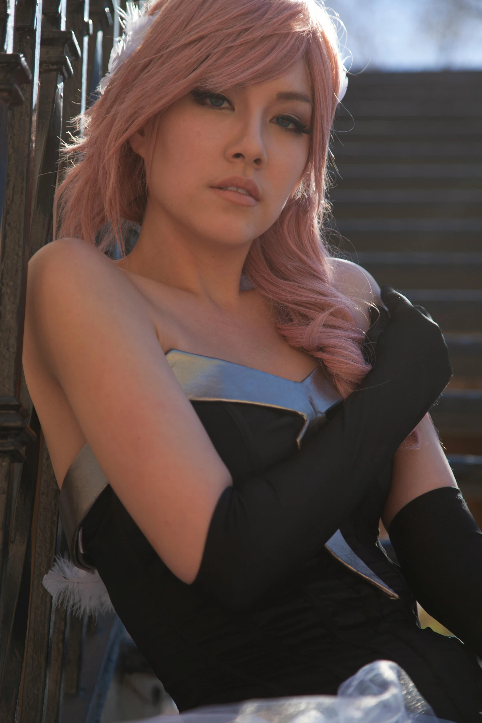 a woman with pink hair posing for a po