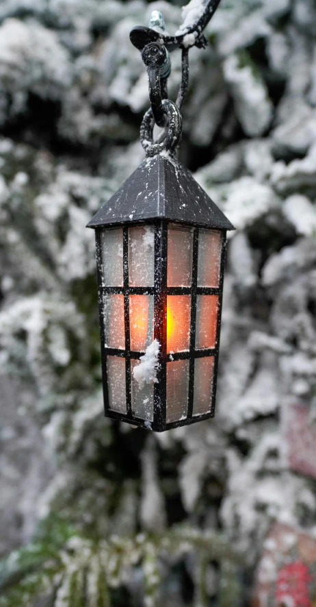 this is a lantern that is made with a mosaic pattern on it