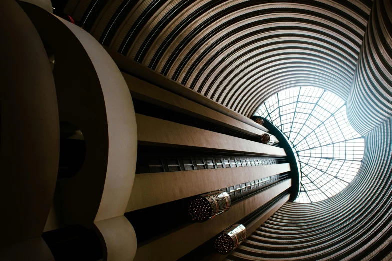 a circular window inside the bottom of a tall building