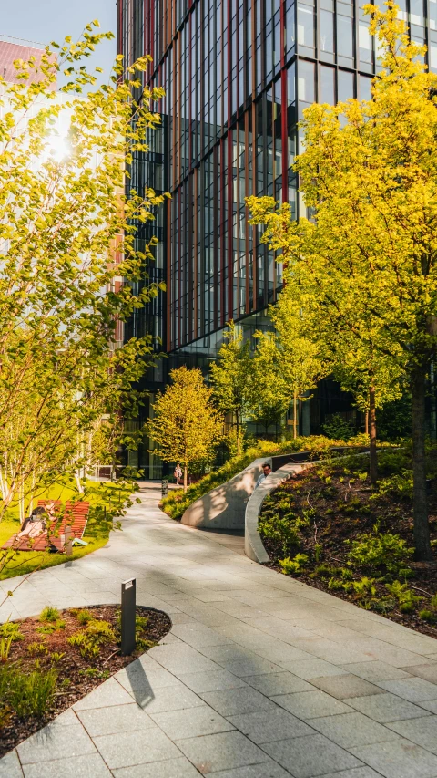 a path going down a stone side by side between two buildings