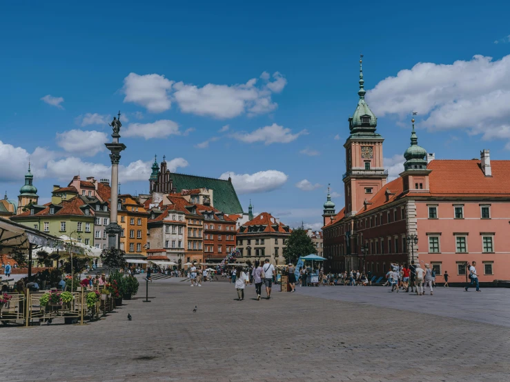 a town street with many buildings in the background