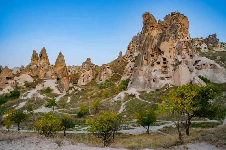 a mountain that has trees on both sides