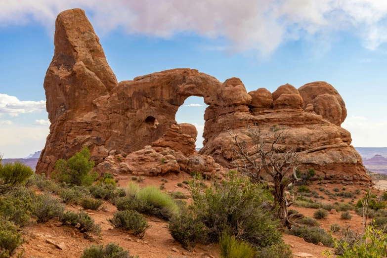 a large arch shaped like an old stone bridge