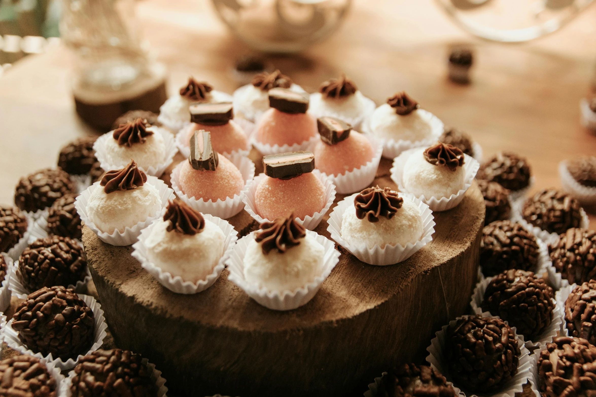 the chocolate cupcakes are decorated with chocolate