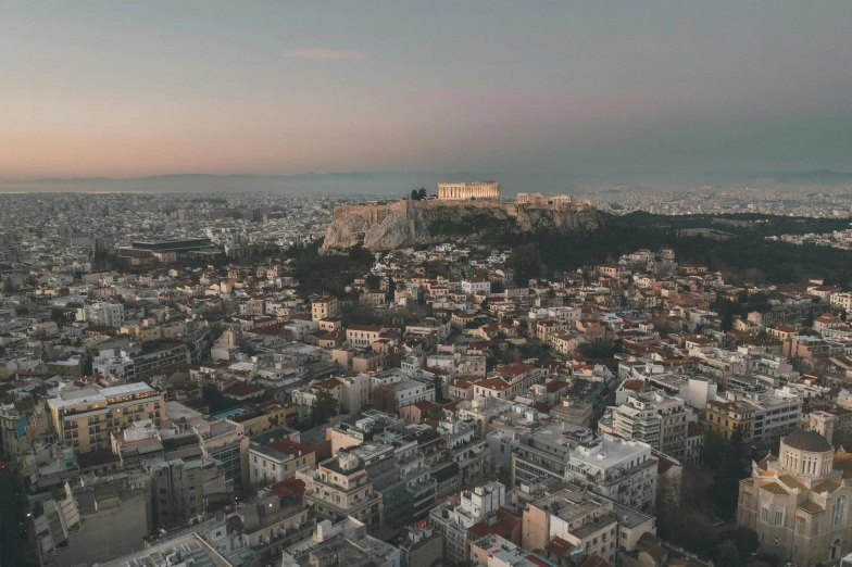 a city with a lot of buildings in the distance