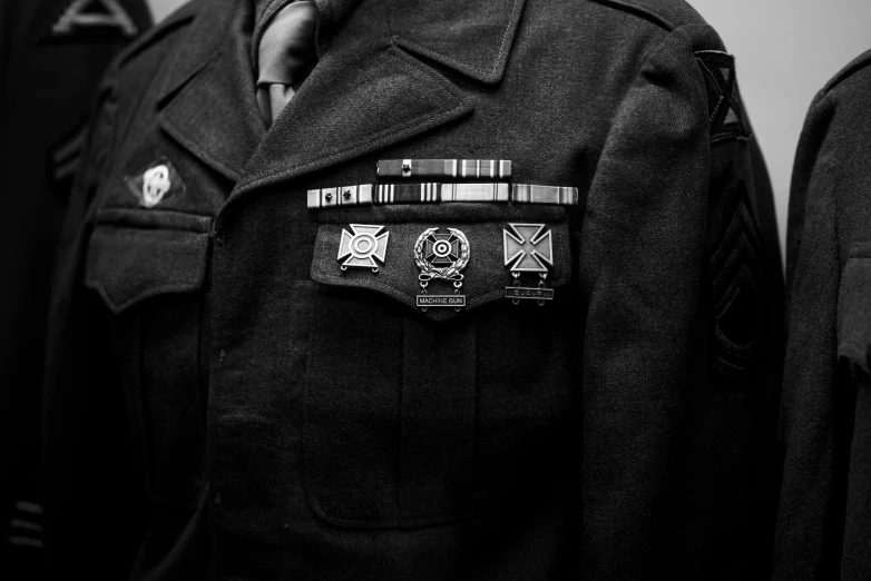 black and white pograph of a uniform from the front