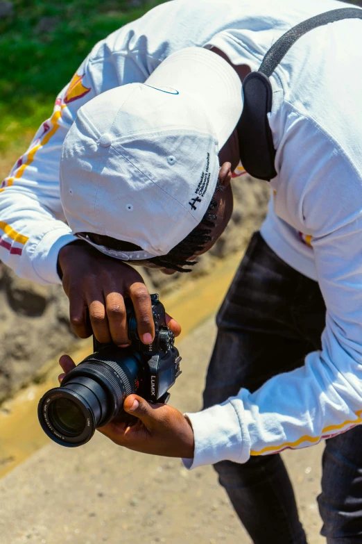 a man taking a picture with his camera