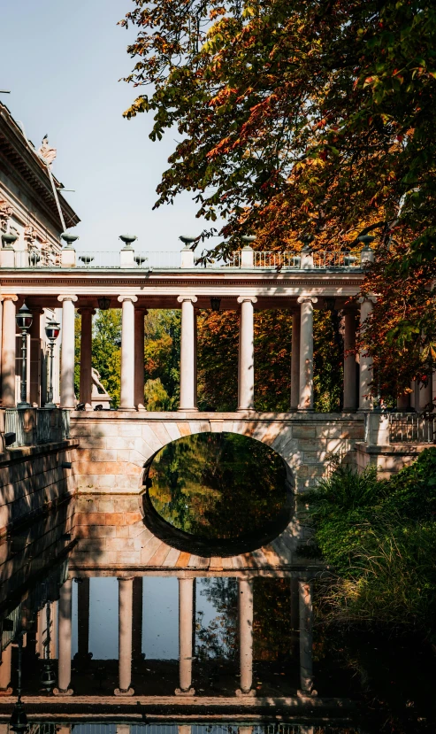 a brick bridge with arches and pillars